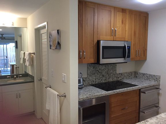 View of kitchen beverage center on lower left, with ref draw