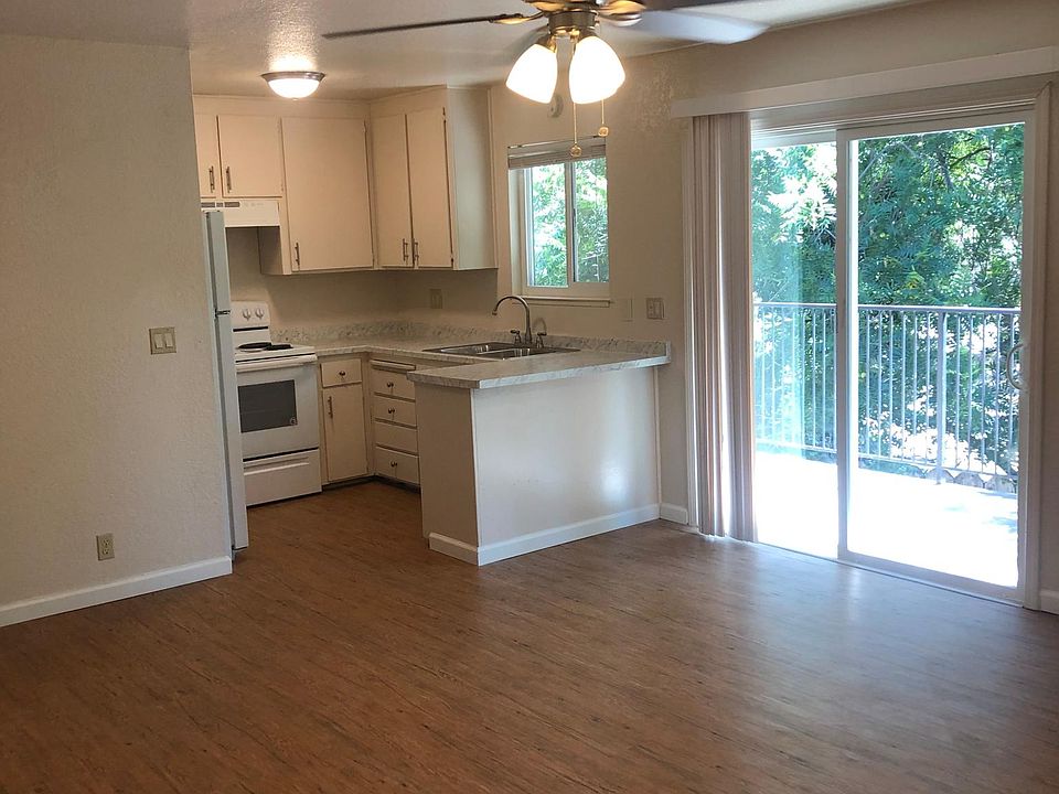 Open Livingroom/kitchen with brand new laminate floors throughout