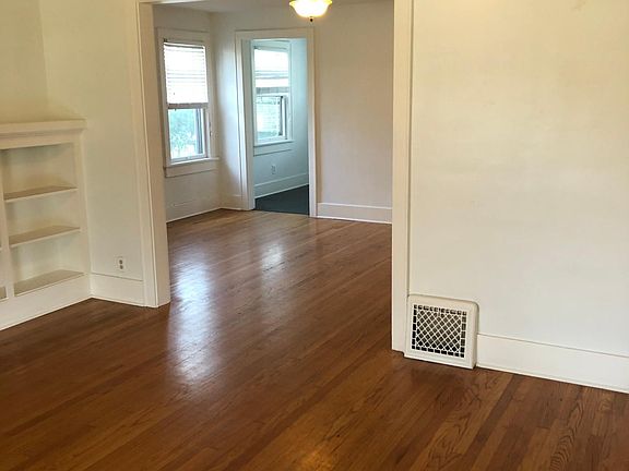 Living room looking into the dining room.