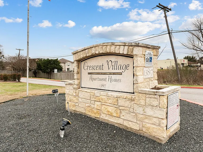 Elegant Monument Sign at Crescent Village Apartments in Elgin, TX