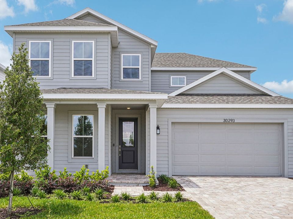 Plumeria Floor Plan Front Exterior Elevation by DRB Homes in Trailside located in Mount Dora, FL