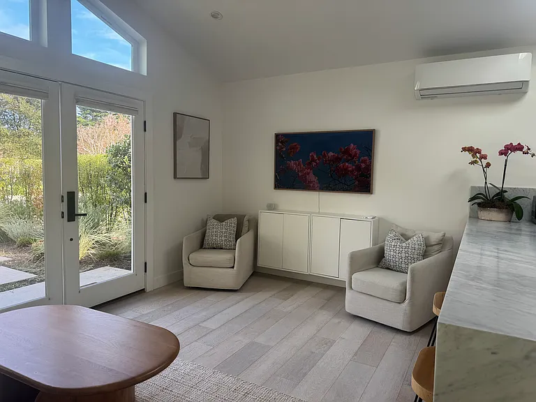 Fram TV in Living Room, AC/Heat Split system in Kitchen