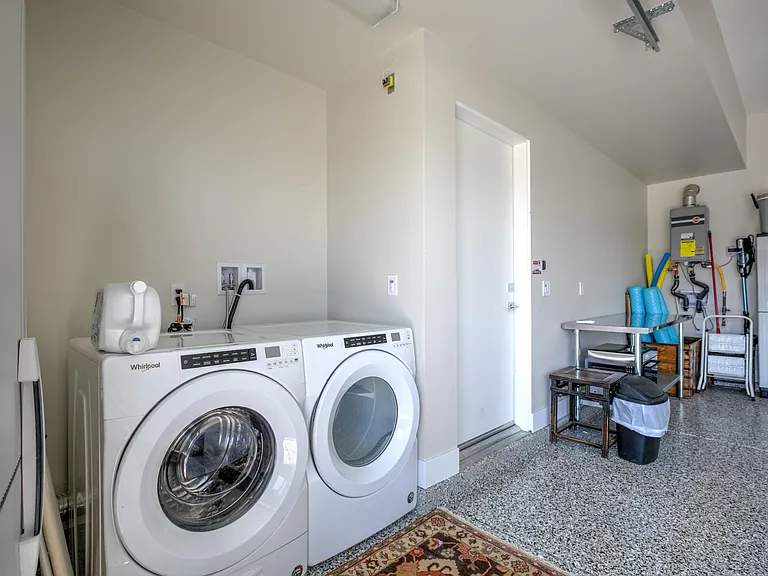 Washer and dryer in garage.