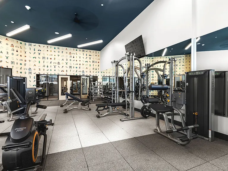 Club-quality fitness studio with TRX studio and TVs