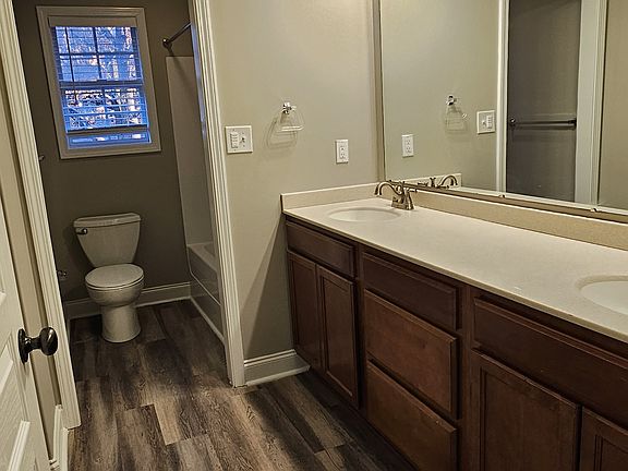 Hall Bathroom - with double vanity, shower and W/D hookups