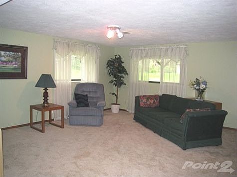 Finished lower level, large family room, bedroom, bath and tons of storage