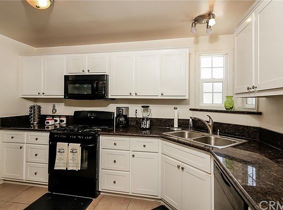 Nicely updated kitchen, granite countertops, nice quality cabinets, all updated about 2010.