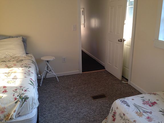 Twin bedded room on other end of home