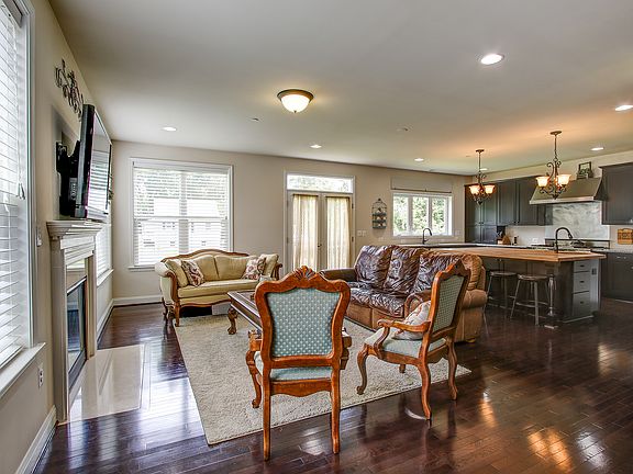 Open living room w/ gas fp