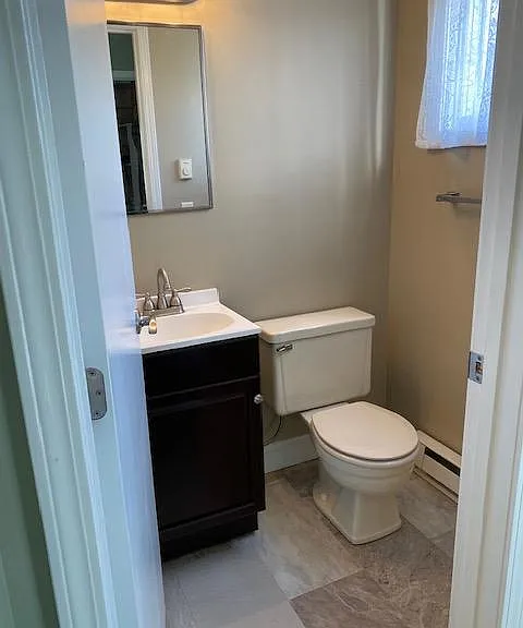 New flooring and sink, first floor half bath