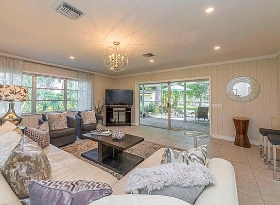 Large living room with lovely view of the landscaping