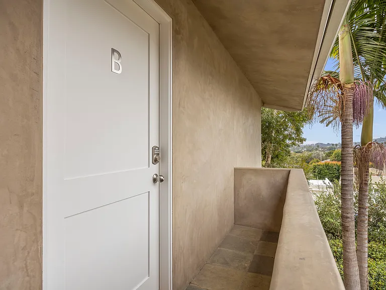 Upper door access to Unit B.