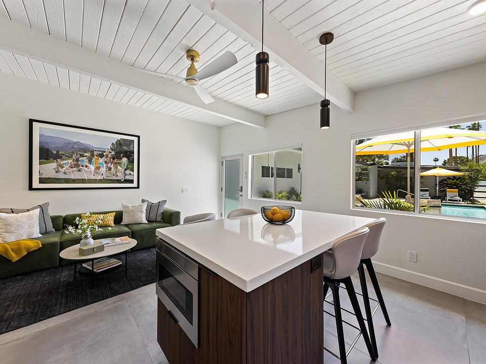 Kitchen with Living Area View and Pool View