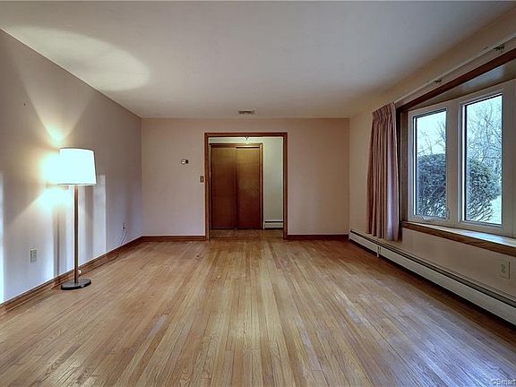 Large, bright formal living room with pretty bay window!