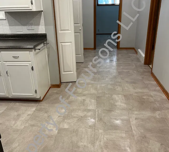hallway off kitchen to seperate master