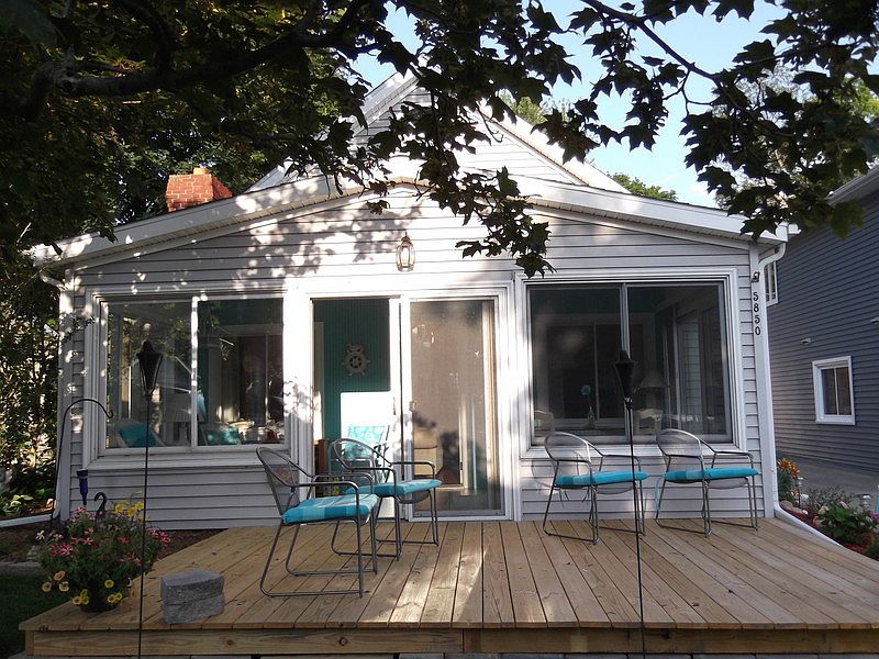 Front
						:
						New deck added in May to sit on and view the lake.