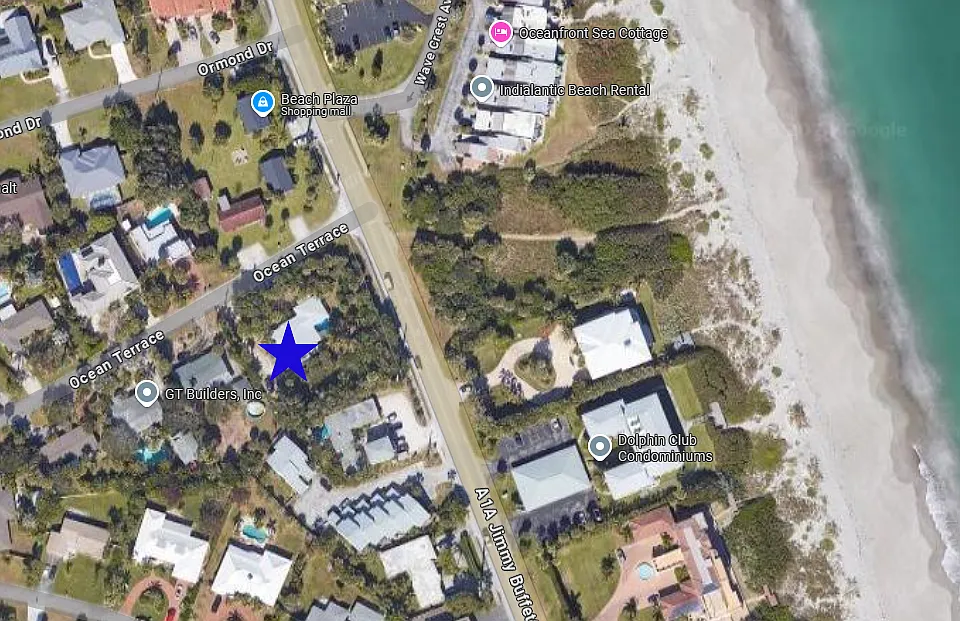 Blue star is apartment location. Private beach access located across the street - pedestrian crossing with flashing light signal for cars to stop.