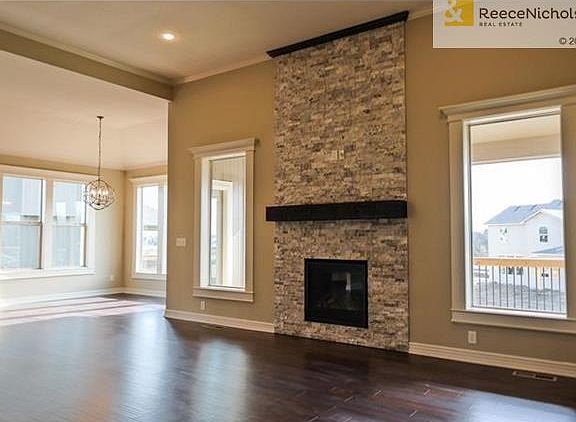 Great Room with oversized gas direct vent sealed until fireplace. Pre-wired for 5-speaker surround sound, security and HDMI under 10'.