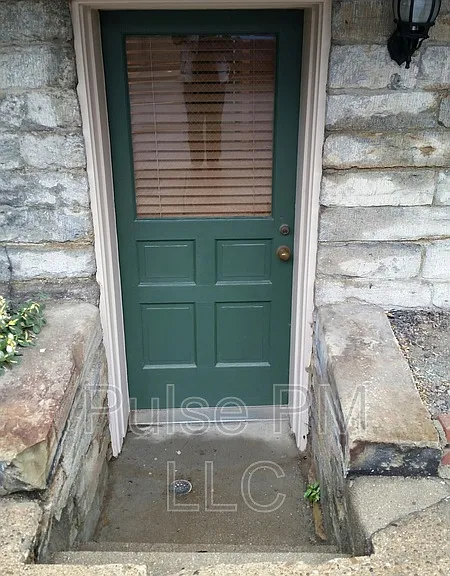 112 E 5th St #LOWER LEVEL — Photo 1