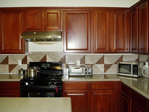 A lot of storage and counter top. A ventilation hood for air flow.