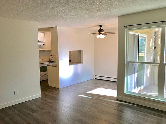 living rm, dining rm, kitchen, all new flooring