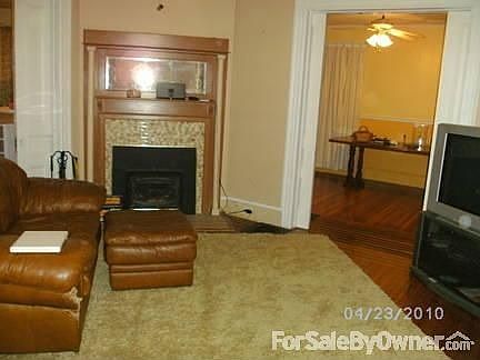 Lv Rm
						:
						pocket doors on 2-sides, joins the den & other side connects dinning room