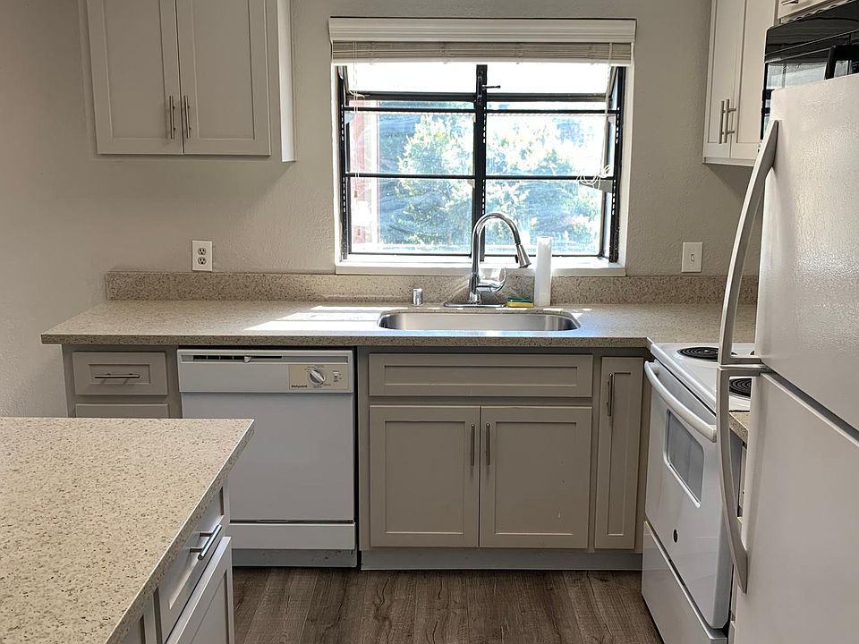 Bay-style window over the kitchen sink brings in lots of natural light