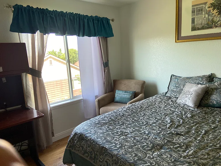 2nd queen bedroom with a slight mountain view