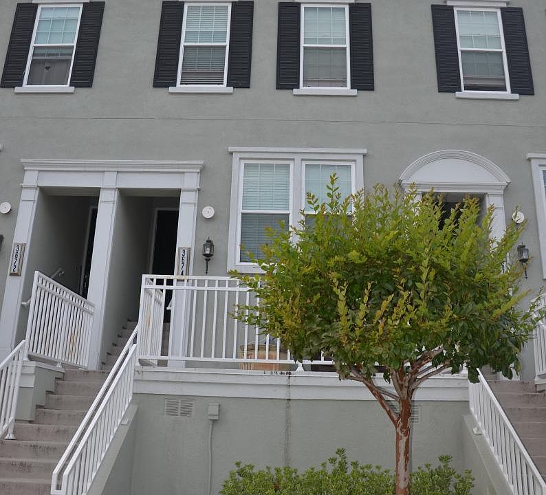 Front of the home on Whitworth Dr, right across from the pool..