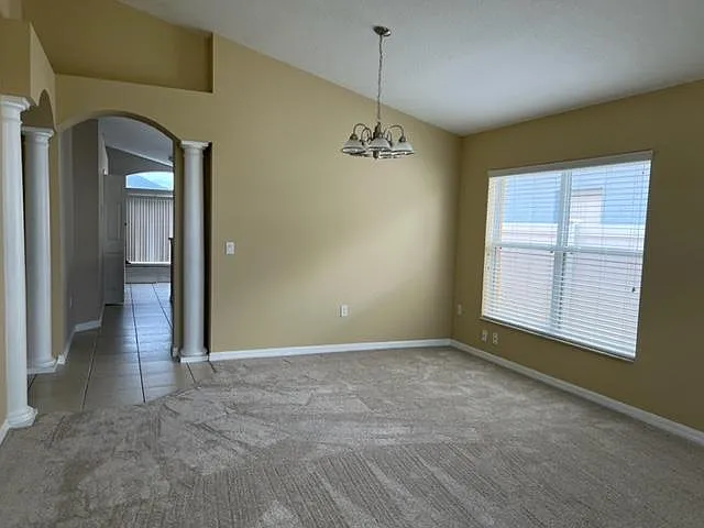 Entrance from dining area towards Kitchen and family room