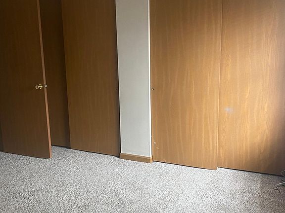 bedroom with double closets