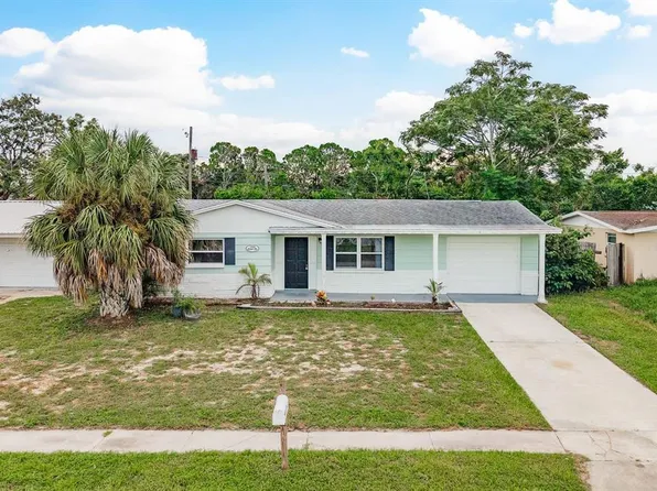 1306 Honor Dr, Holiday, FL 34690