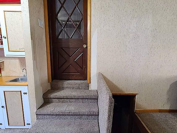 Door to Kitchen & Basement A