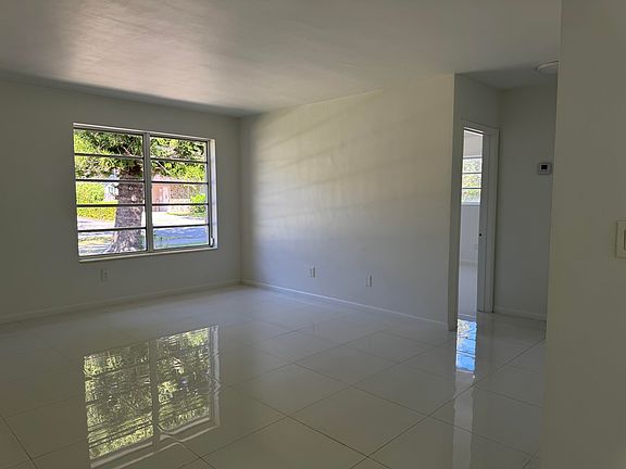 Another view of the spacious open living area and the second bedroom