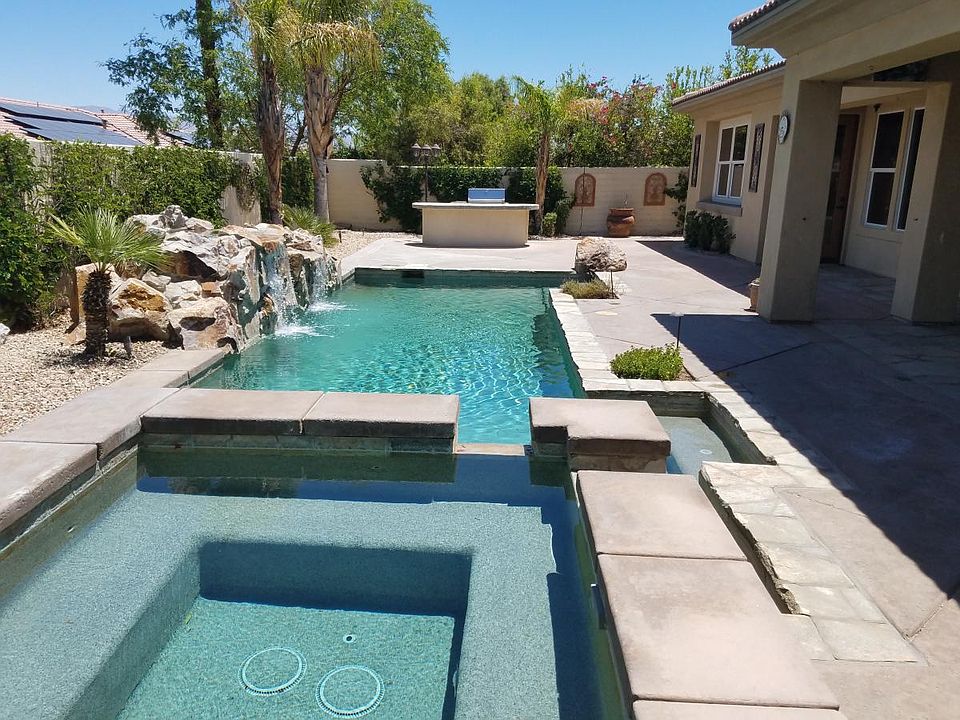 the private yard, pool and spa