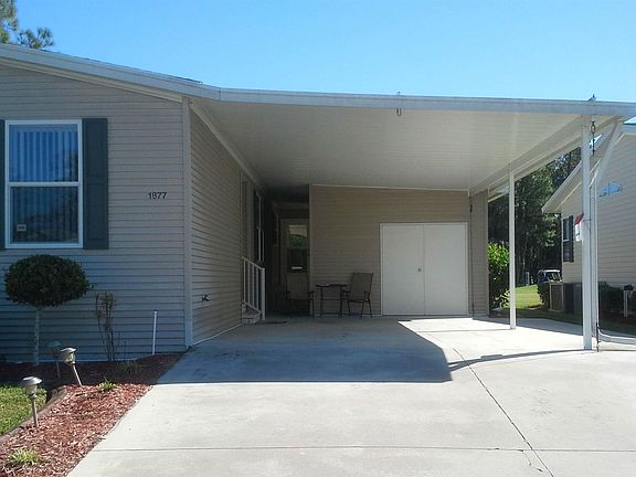 Over sized driveway and carport