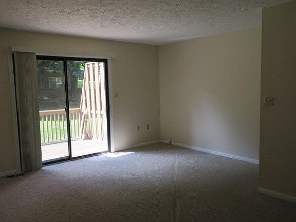 Living Room with Sliding door to rear Deck and Yard.
