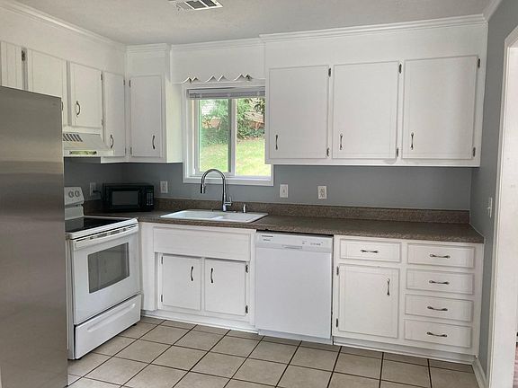 Electric stove plus dishwasher.