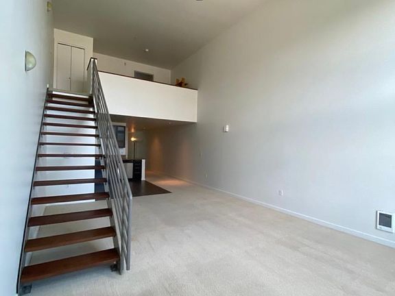 Sitting room and stairs up to main bedroom