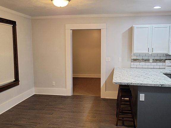 Dining area and countertop bar seating for 3