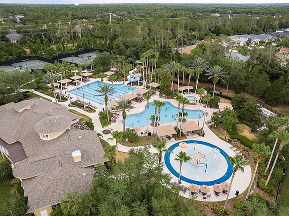 Resort Style Amenities - Water Slides, gym Kids Playground, splash pad, olympic 50 meter pool, relaxation pool, basketball, tennis and volleyball courts