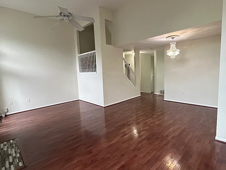 From the living room area, looking at the dinning room and main entrance