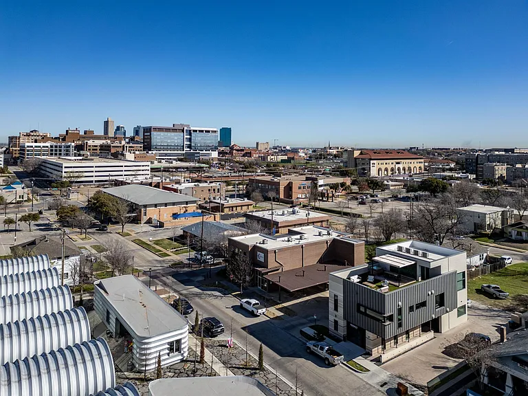 Aerial exterior view of home + neighborhood
