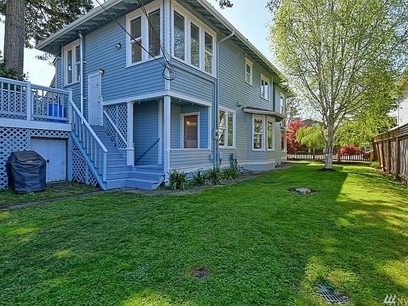 Back yard, upstairs entrance on upper deck, basement stairs 