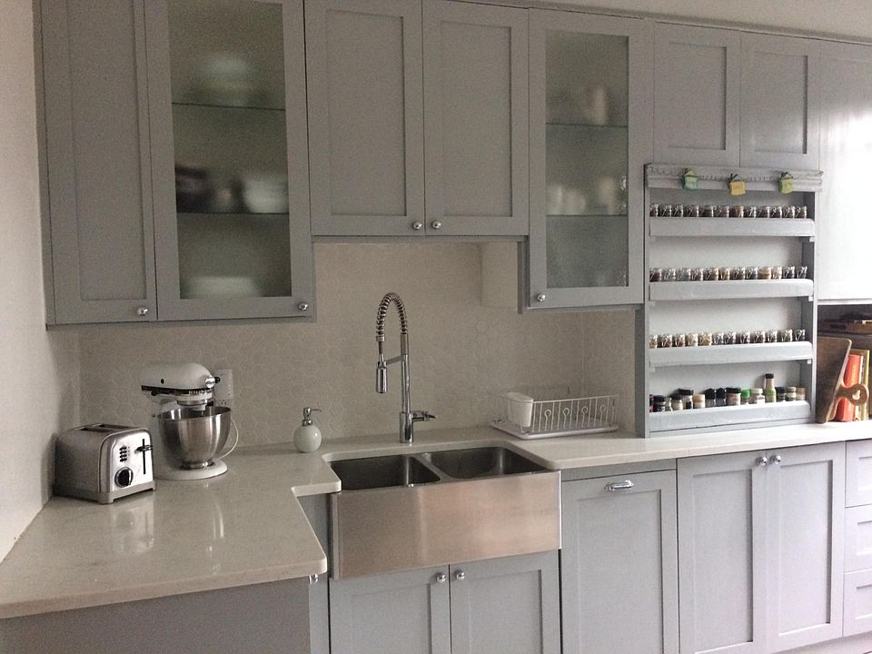 Custom built kitchen with a built-in dishwasher and spice rack, perfect for the chef in your family