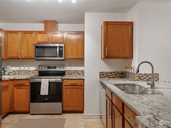 5th image of 18501 SE Newport Way Unit J139
