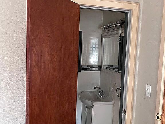 1/2 bathroom in main floor bedroom