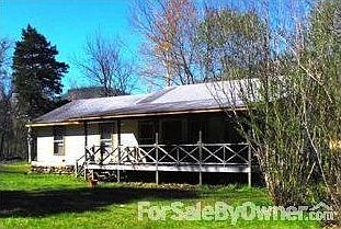 North view - the length of the property
						:
						Taken from the covered deck on the east side of the house...creek side.