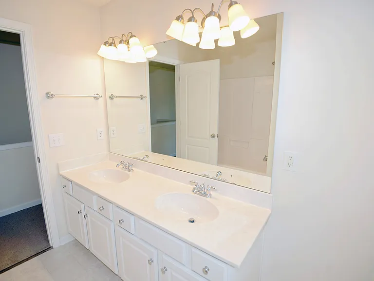 Upstairs hallway bath view 2, double sinks