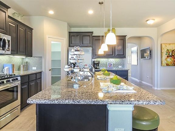 Photos shown here may not depict the specified home & features included are for illustration purposes only